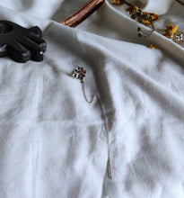 Kumud ear clip on a long chain