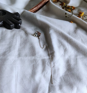 Kumud ear clip on a long chain