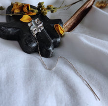 Kumud ear clip on a long chain