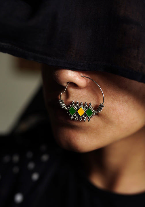 Hari peeli nose ring (left side)